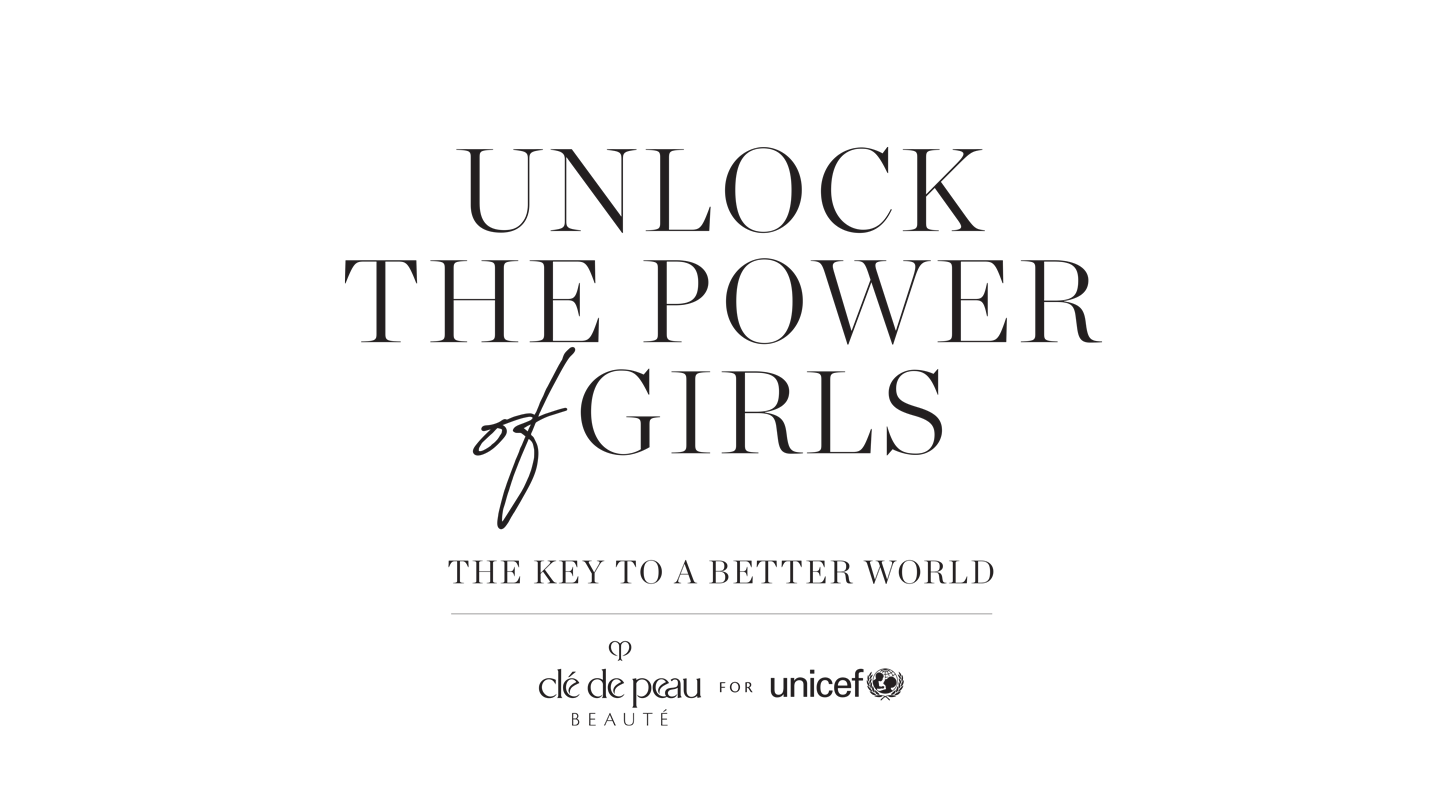 Text logo of "UNLOCK THE POWER of GIRLS &ndash; THE KEY TO A BETTER WORLD", with Cl&eacute; de Peau Beaut&eacute; and UNICEF logos below.