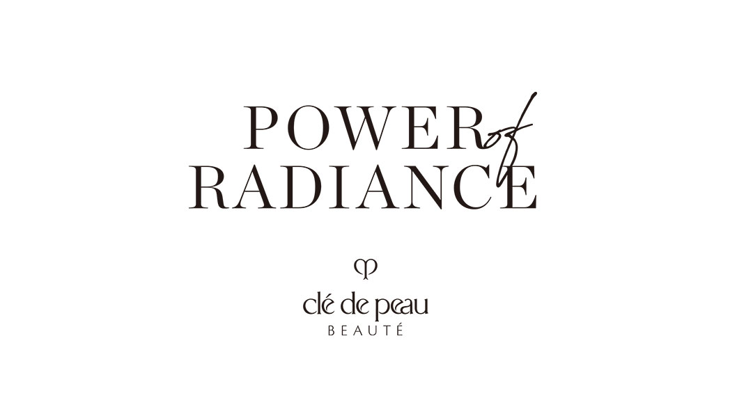 Text logo of "POWER of RADIANCE" with the Cl&eacute; de Peau Beaut&eacute; logo below.