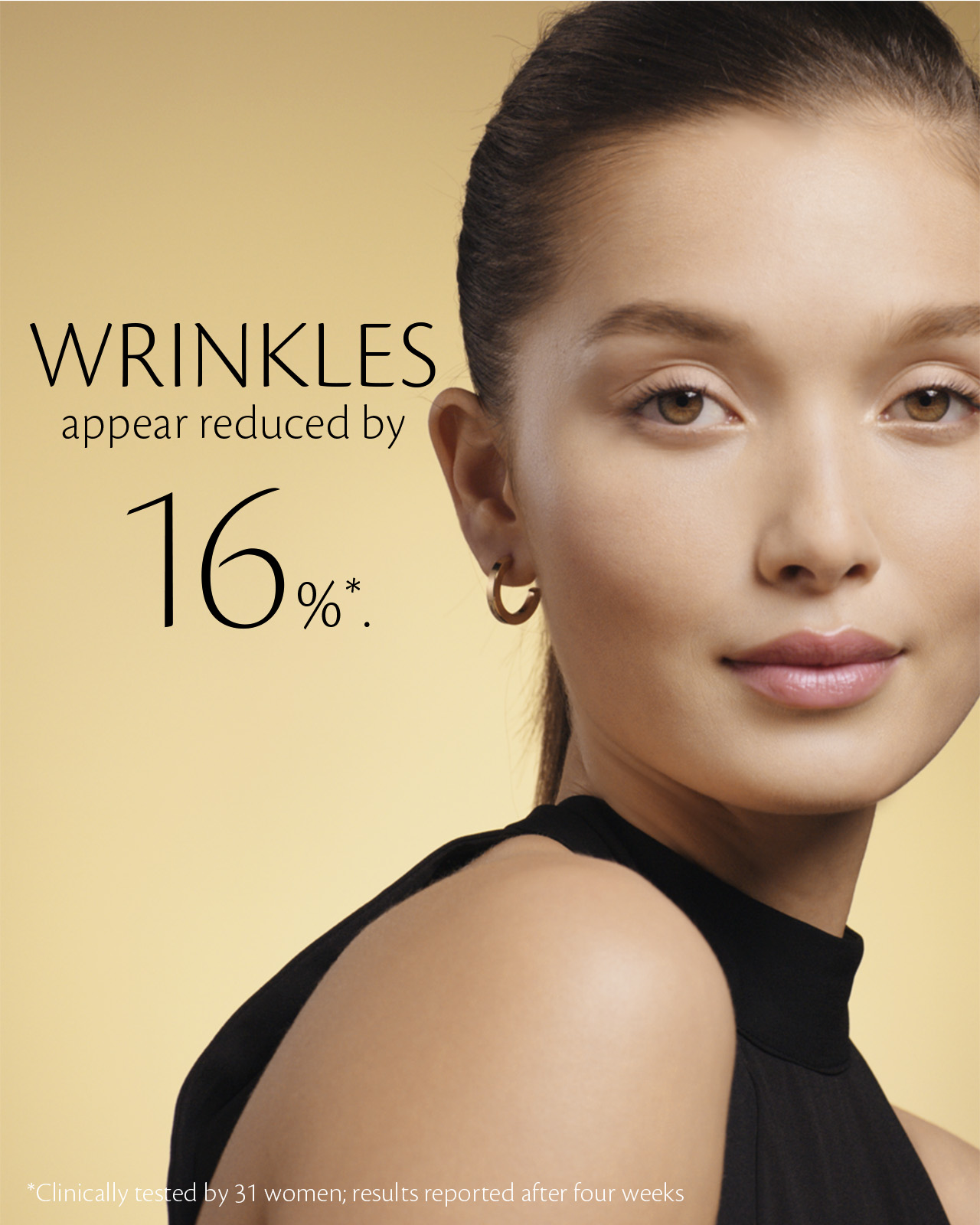 Photo of a woman with smooth skin against a golden background. On the left, text reads: &ldquo;WRINKLES appear reduced by 16%*.&rdquo; A note at the bottom states: &ldquo;*Clinically tested by 31 women; results reported after four weeks.&rdquo;