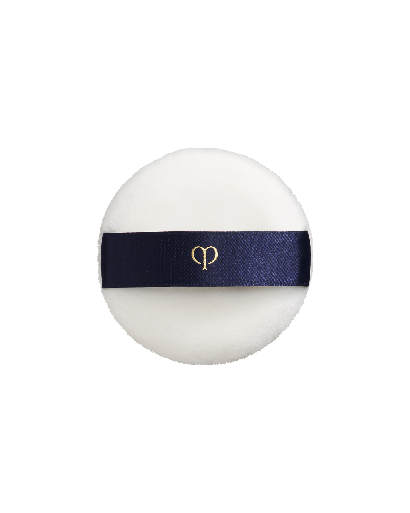 Photo of a soft, round and white "PUFF (TRANSLUCENT LOOSE POWDER)". It has a blue-black ribbon handle engraved with the gold brand-logo.