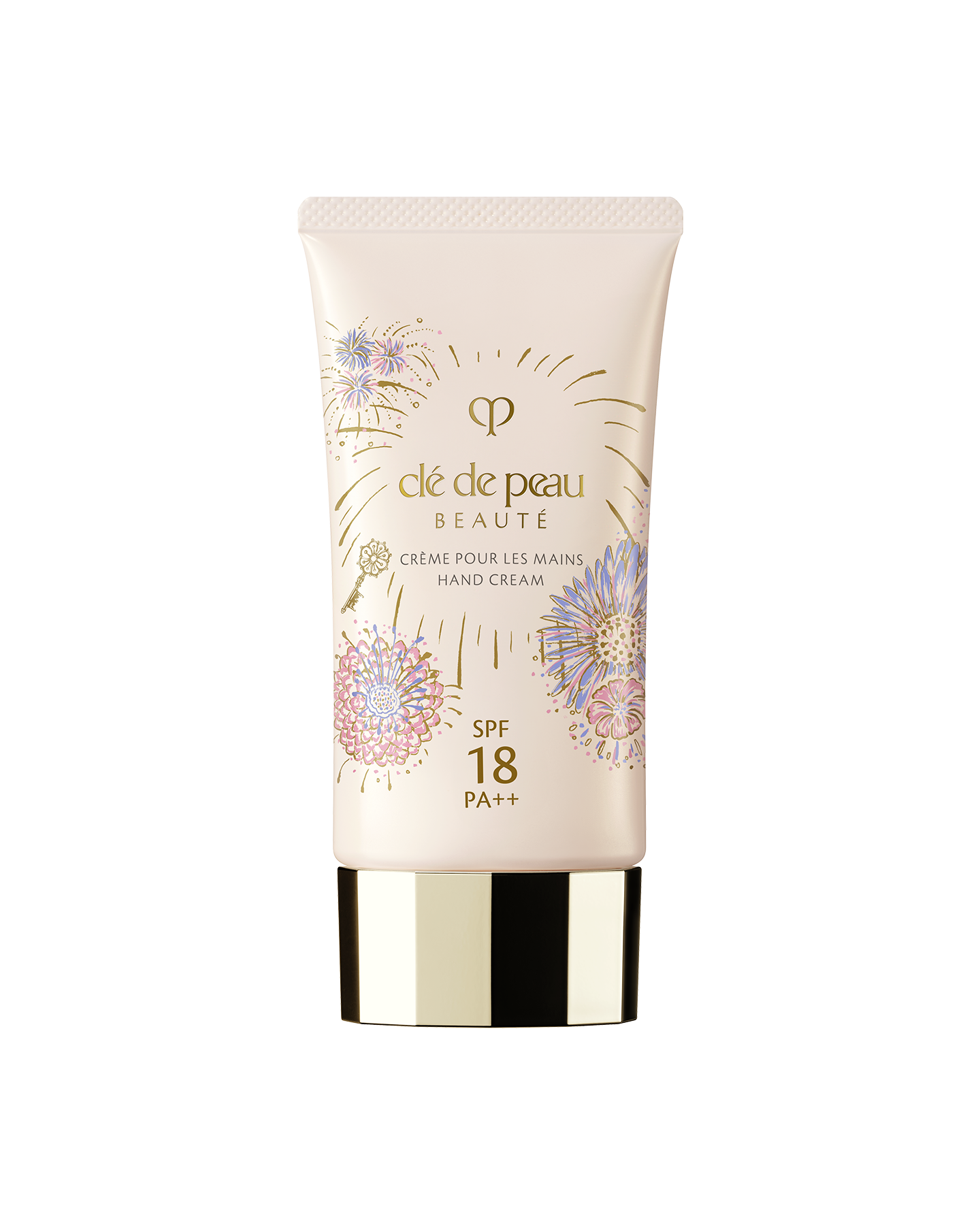 Photo of the 26 SS Gift Collection limited-edition HAND CREAM. The light pink tube features the Radiance Fireworks design with illustrations of flowers blooming like fireworks and a key motif. 