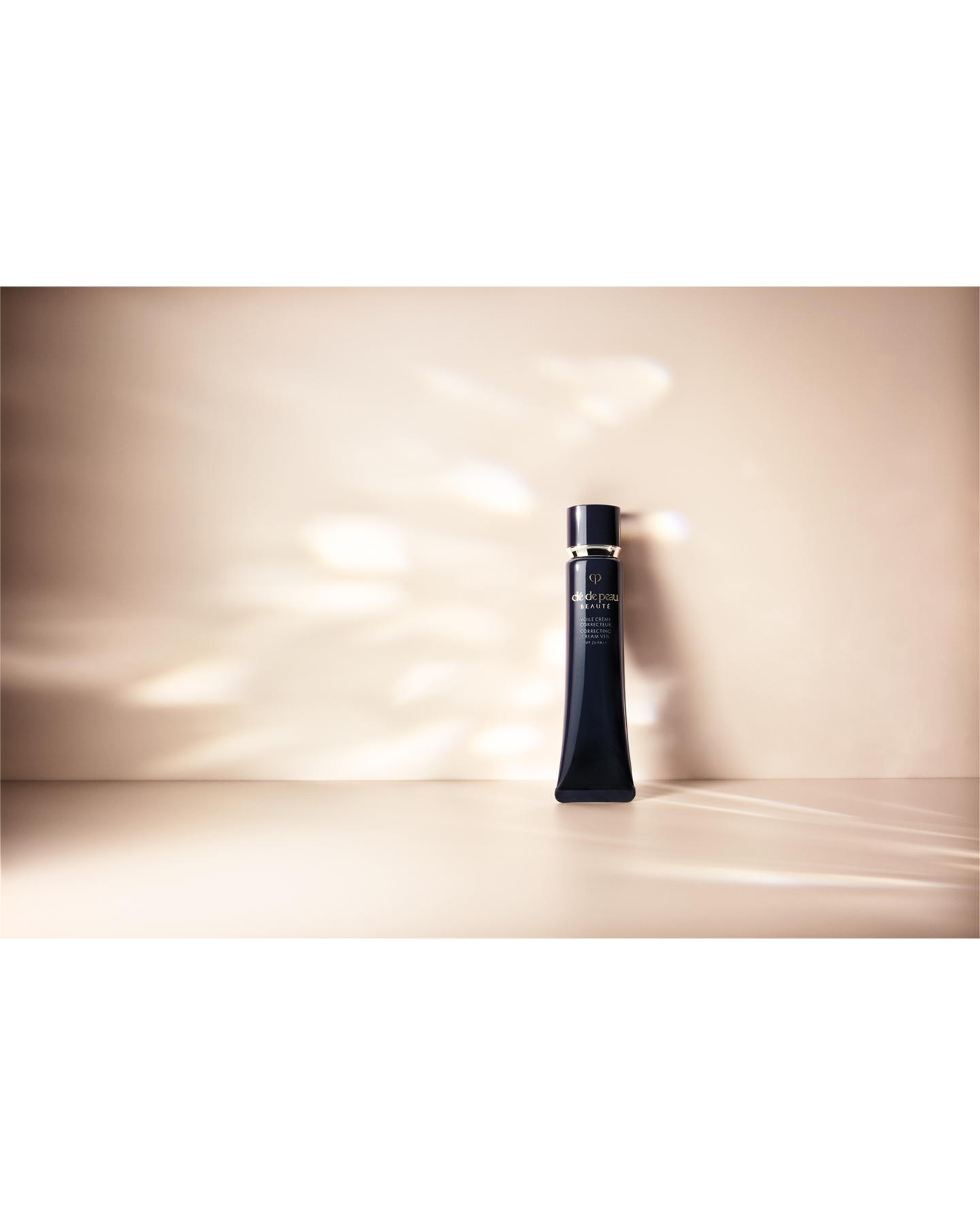 Close-up photo of the brand logo on "CORRECTING CREAM VEIL."