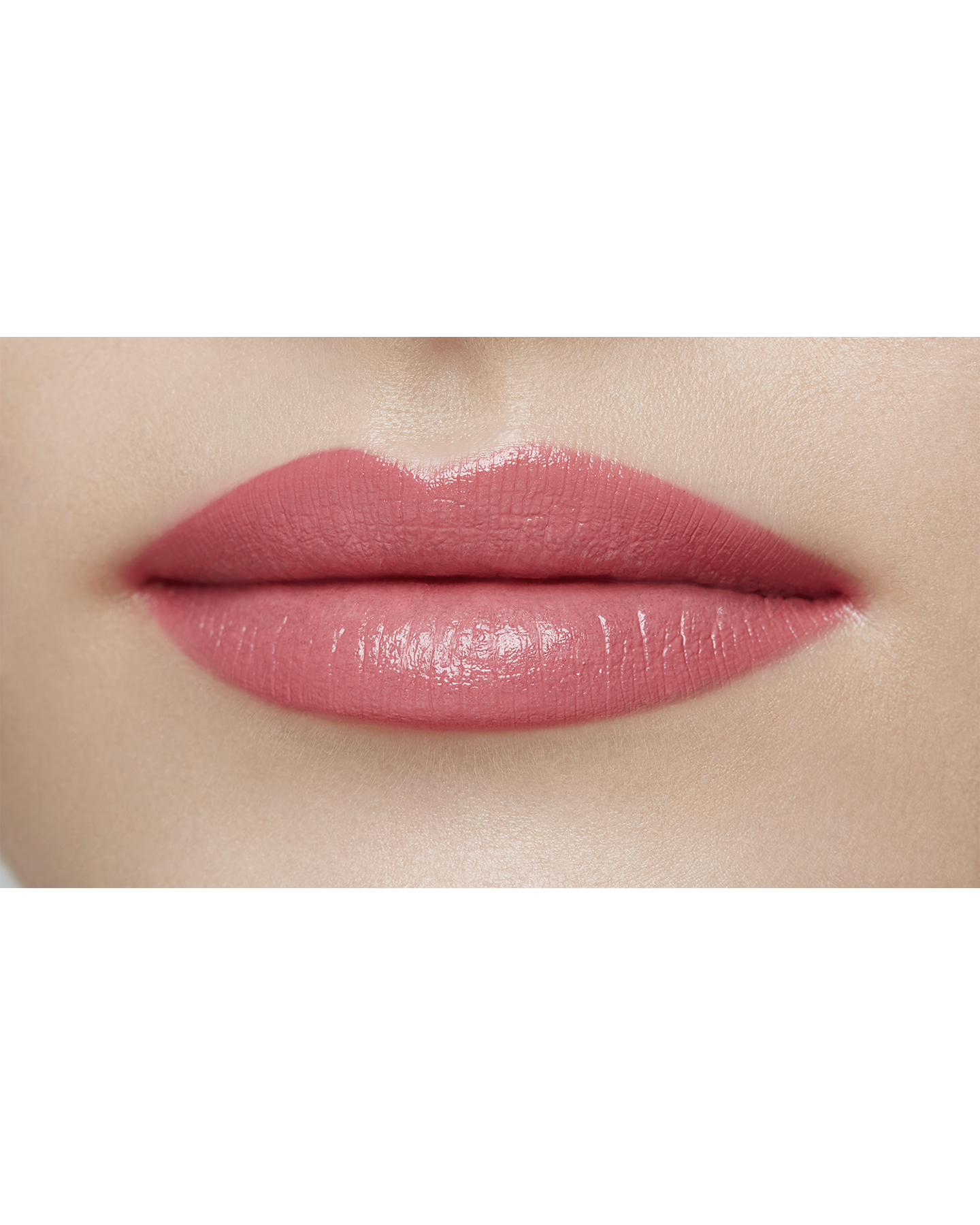 Photo of a light skin tone model  wearing "LIPSTICK MATTE" in High Achieve on the lips.
