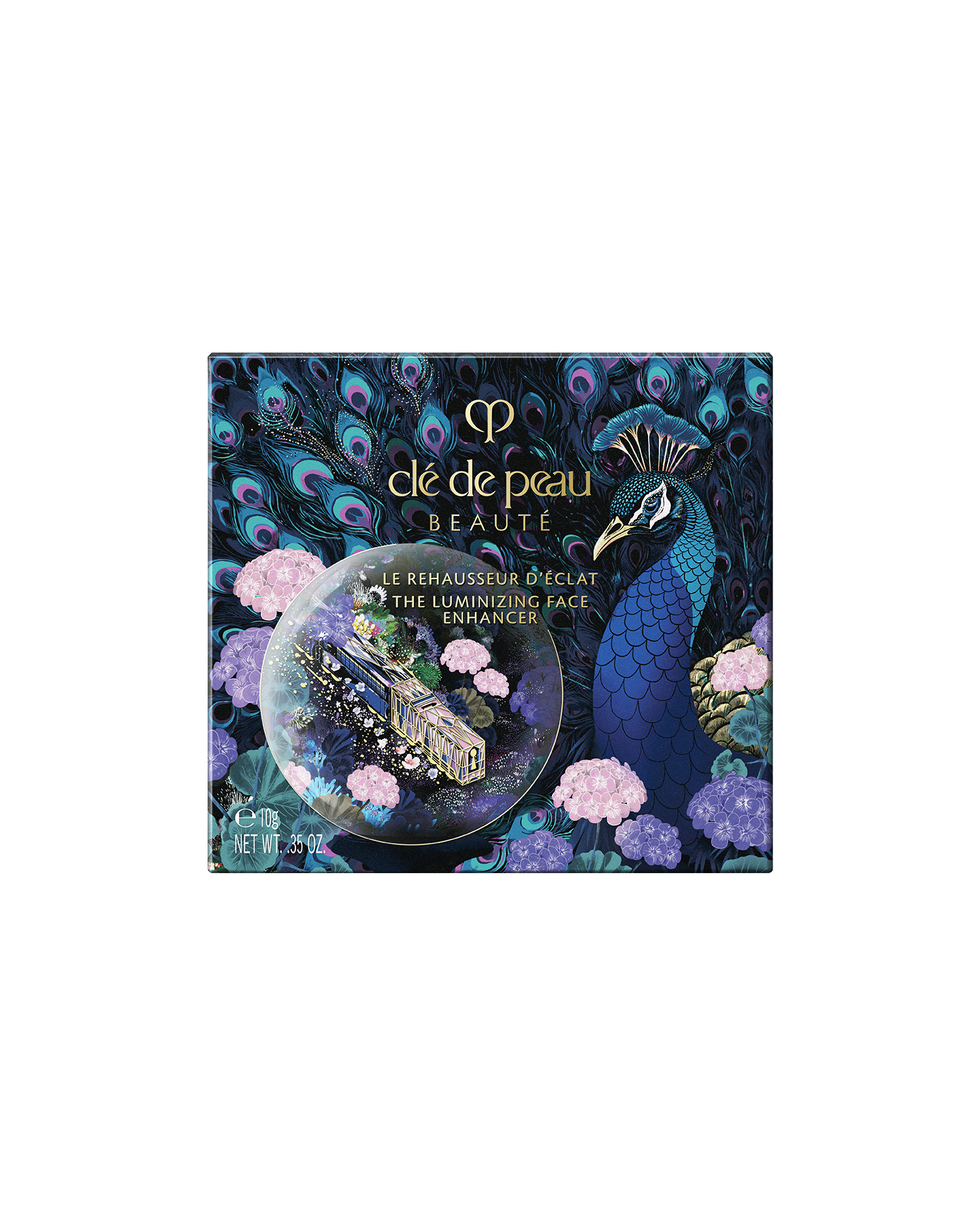 Photo of the outer box of the limited-edition THE LUMINIZING FACE ENHANCER Radiant Peafowl, decorated with peacocks, hydrangeas, and vibrant floral details.