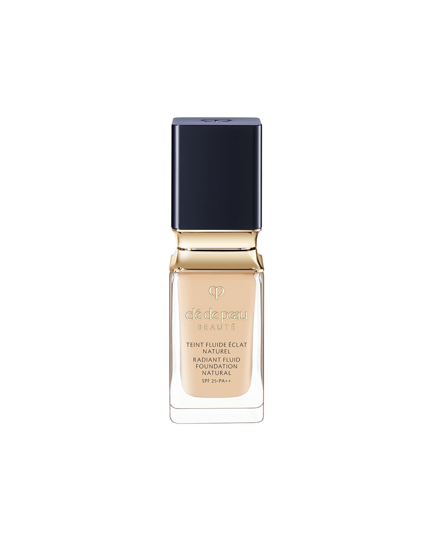 Photo of a bottle of "RADIANT FLUID FOUNDATION NATURAL". The liquid foundation comes in a thick, clear glass bottle, featuring a blue-black, square-shaped cap and a gold neck accent. SHADE: O20