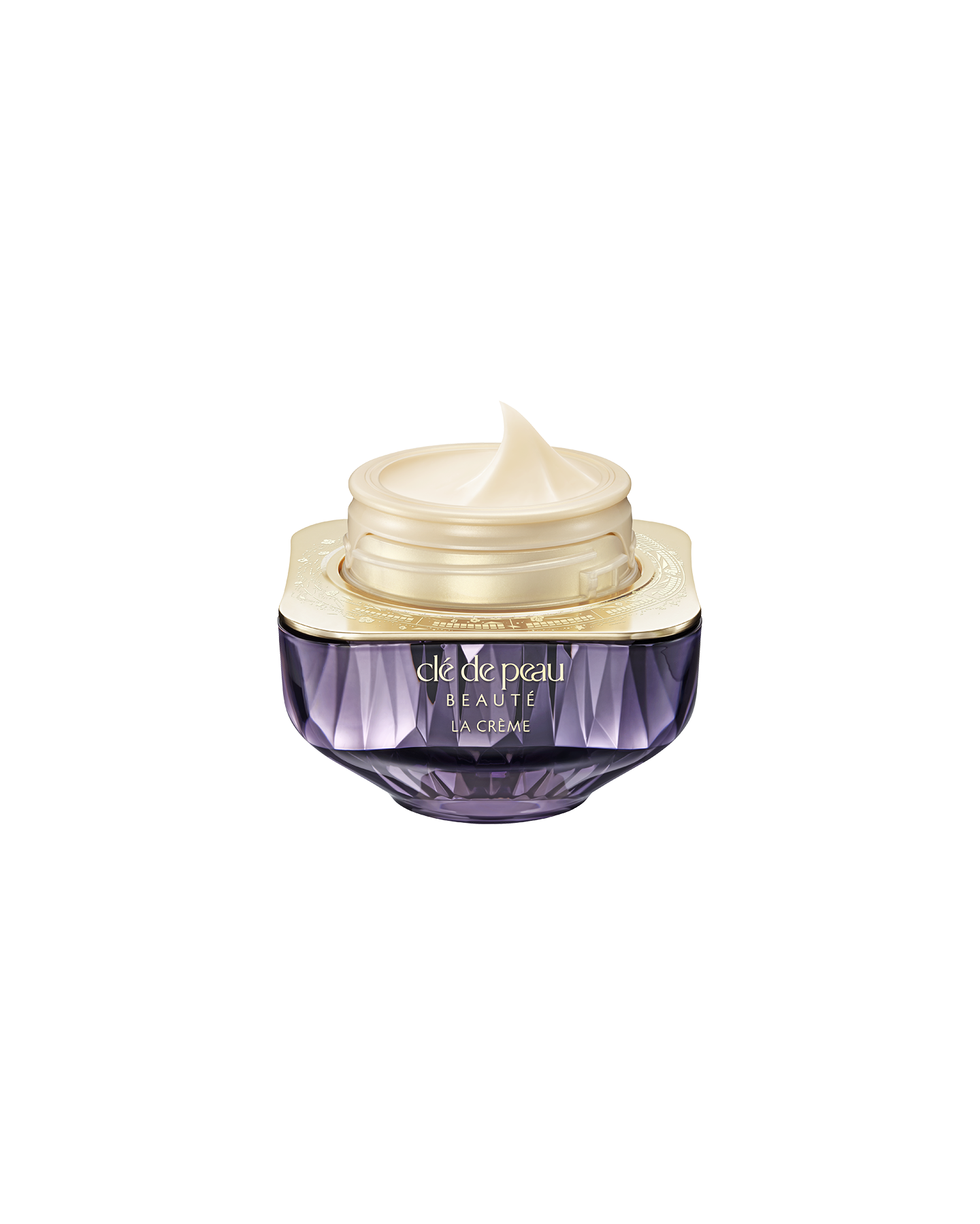 Photo of the limited-edition LA CR&Egrave;ME with the lid open, revealing the smooth cream inside the gold inner lid.
