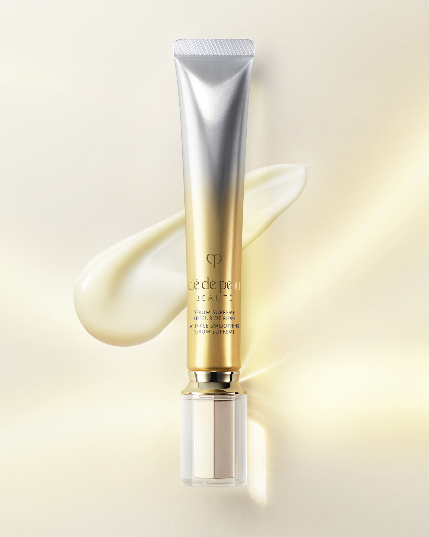 Photo of "WRINKLE SMOOTHING SERUM SUPREME" in a gold and silver gradient tube, with a serum texture in the background.