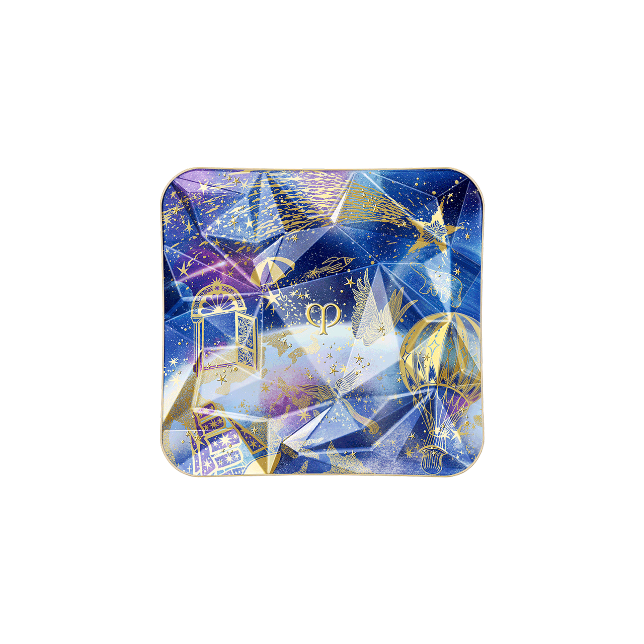 Photo of the 26 AW Holiday Collection limited-edition THE LUMINIZING FACE ENHANCER case. The blue and purple prismatic compact lid features a geometric multi-faceted design detailed with gold illustrations of a door, a hot air balloon, and a shooting star.